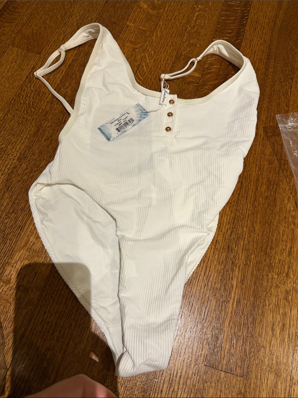 Frankie’s Ribbed One-Piece Swimsuit in Ivory with Button Detail